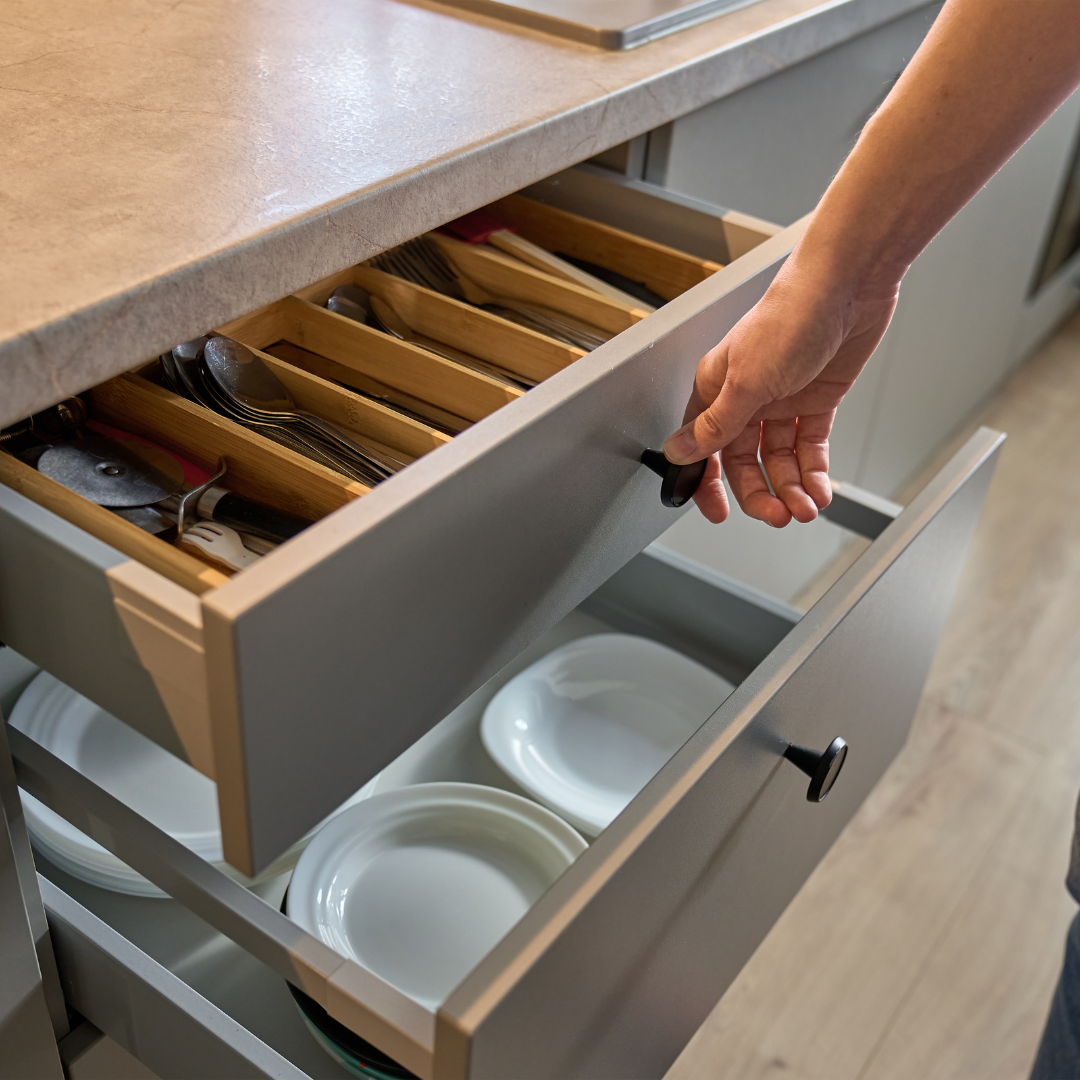 Home organisation maintenance reset of a family kitchen drawer