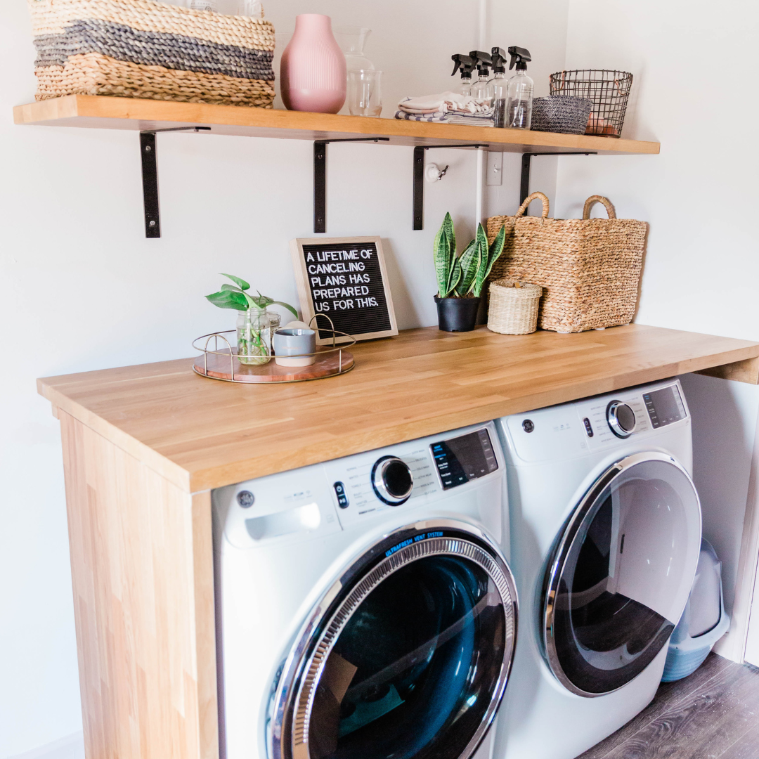 Organised laundry room with sorted baskets — laundry room organisation ideas for busy families