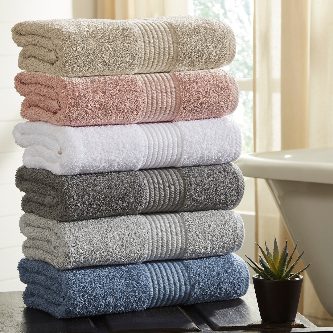 Labelled linen shelf zone a child can use without asking where towels go