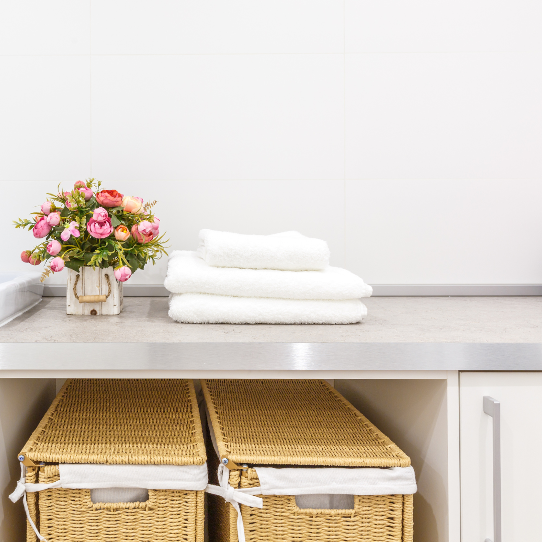 Organised laundry room with sorted baskets — laundry room organisation ideas for busy families