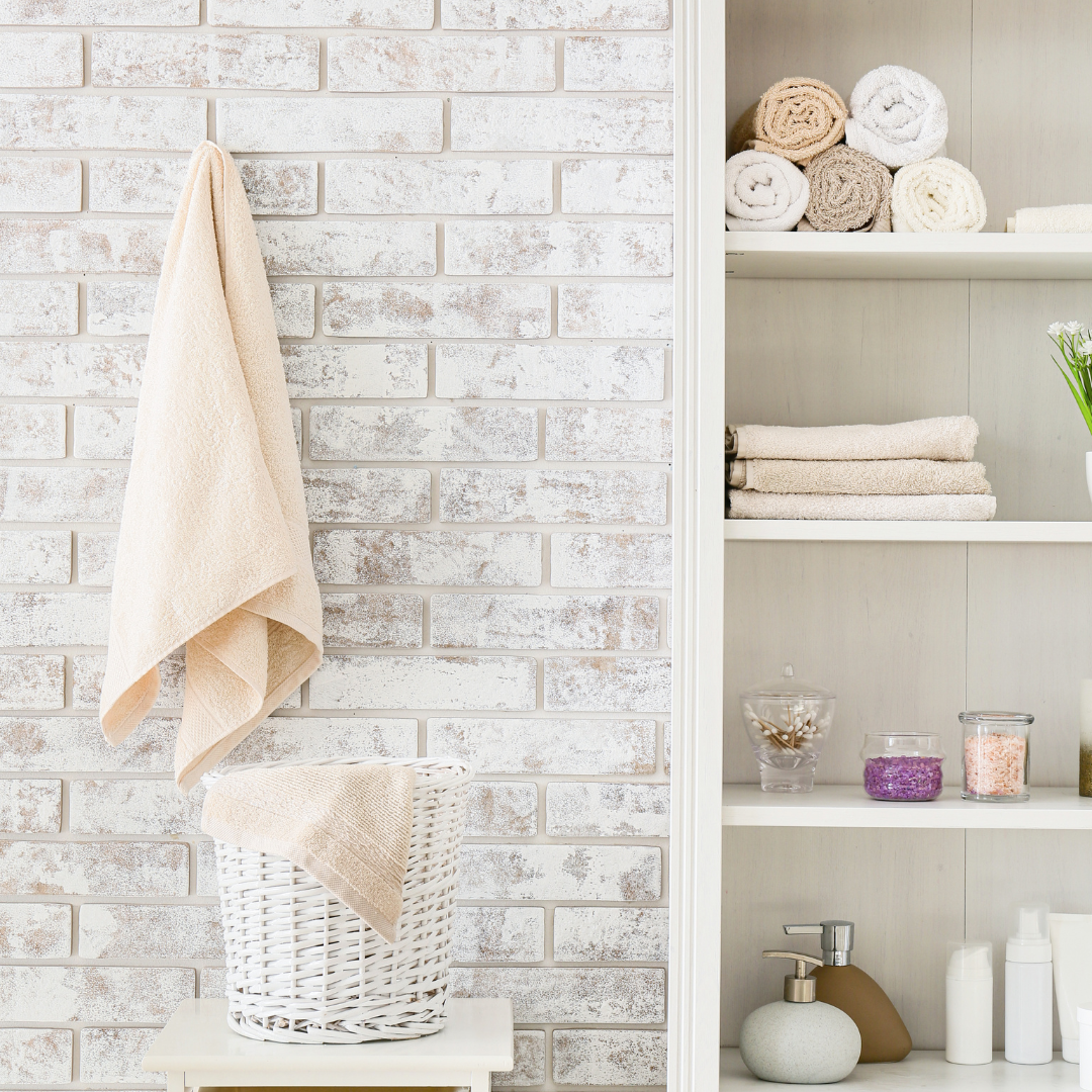 Bathroom cabinet organisation with labelled zones for each family member