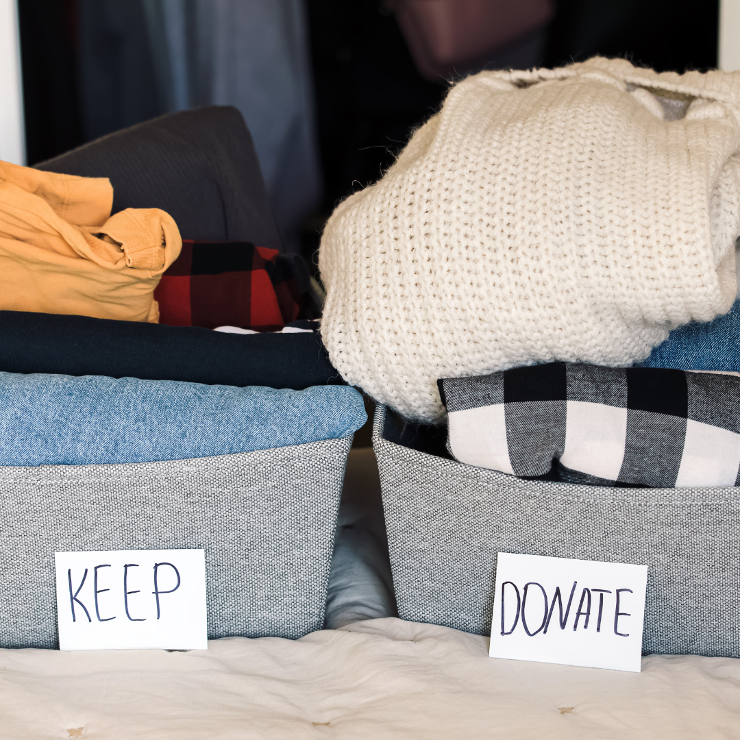 Sorting linen cupboard items into keep, donate, and toss piles