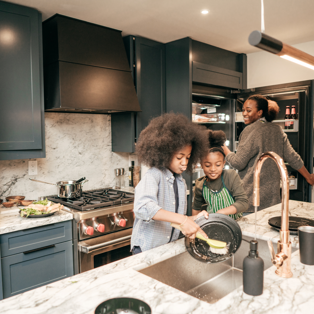 Family doing a quick five-minute tidy reset before bed