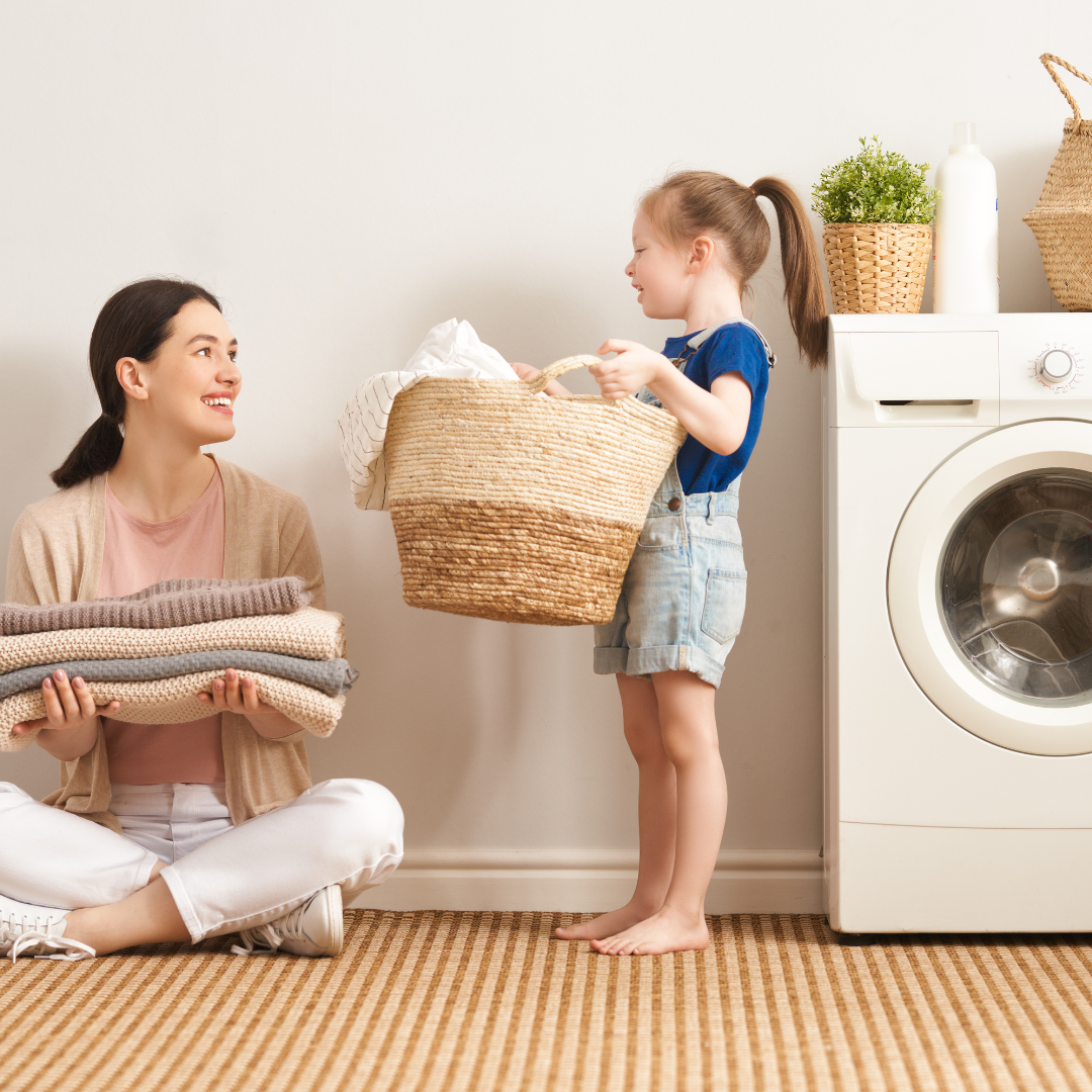 A parent labelling a hamper while setting up the routine